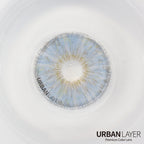 Berkeley Blue Urban-Layer colored contact lenses in a vibrant blue shade, showcasing the lens detail and color intensity.