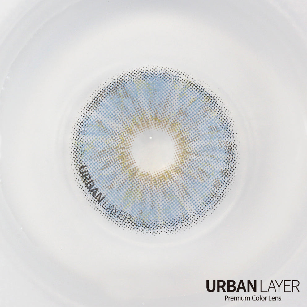 Berkeley Blue Urban-Layer colored contact lenses in a vibrant blue shade, showcasing the lens detail and color intensity.