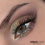 Breeze Light Blue Urban Layer colored contact lenses in a close-up view, showcasing vibrant light blue color and design.