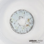 Urban-Layer Gemini Ash Blue colored contact lenses in a close-up view showing the vibrant blue design on the eye.