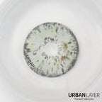 Gemini Gray Urban Layer colored contact lenses in a close-up view, showcasing the vibrant gray hue and detailed texture.