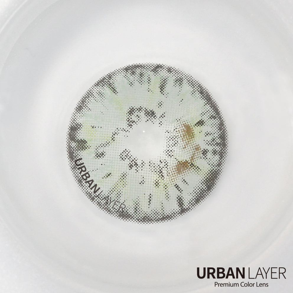 Gemini Gray Urban Layer colored contact lenses in a close-up view, showcasing the vibrant gray hue and detailed texture.