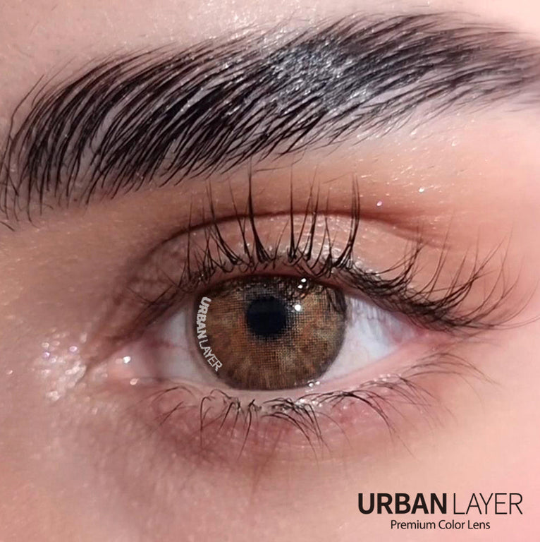 Urban-Layer Gemini Hazel Urban Layer colored contact lenses showing hazel-colored contacts in a close-up view.