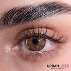 Urban-Layer Gemini Hazel Urban Layer colored contact lenses showing hazel-colored contacts in a close-up view.