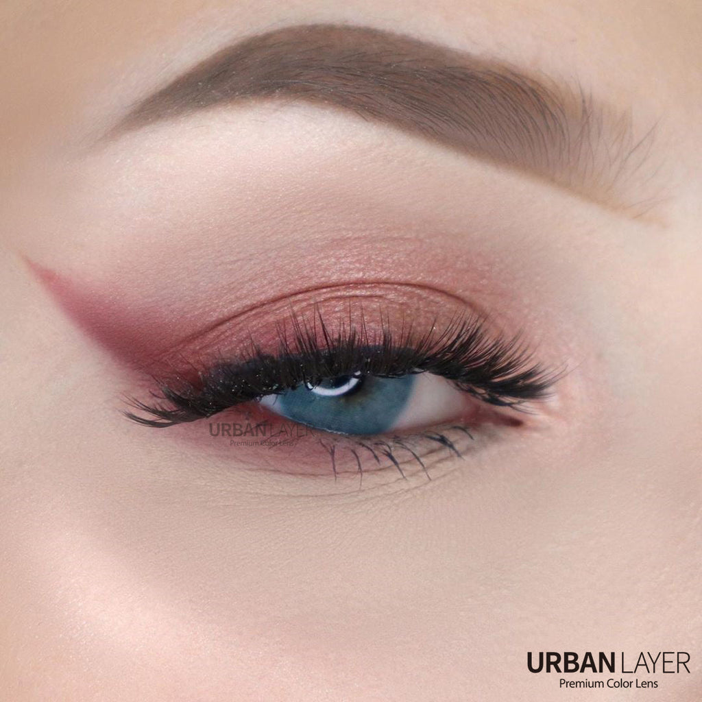Urban-Layer Maldives Blue Urban Layer colored contact lenses showing vibrant blue eye enhancement on a model.