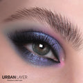 Hockney Emerald Urban-Layer colored contact lenses in a vibrant green shade for a striking eye enhancement.